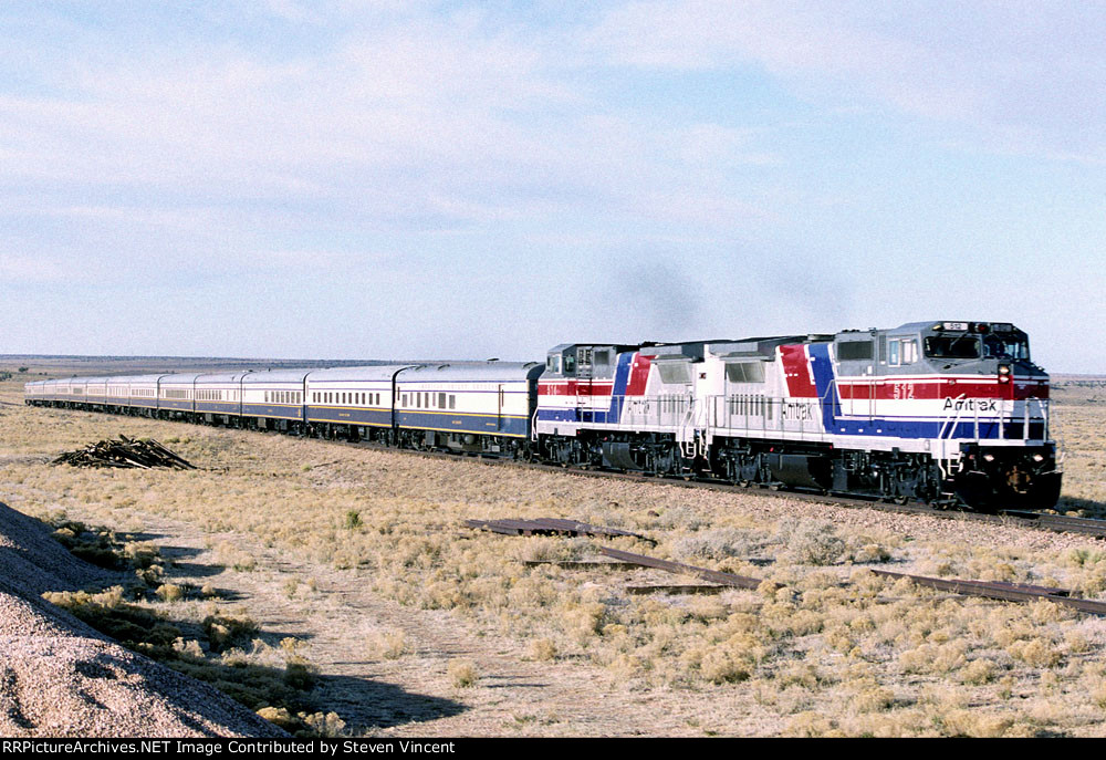 Pepsi scheme Amtrak #512, #514 lead AOE train toward the Grand Canyon at Anita (GCRY).